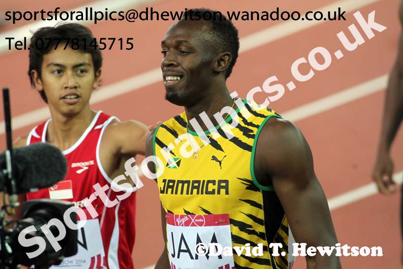 Usain Bold (Jamaica) after running in the 4 x 100 metres heats at the Commonwealth Games, Glasgow. Photo: David T. Hewitson/Sports for All Pics